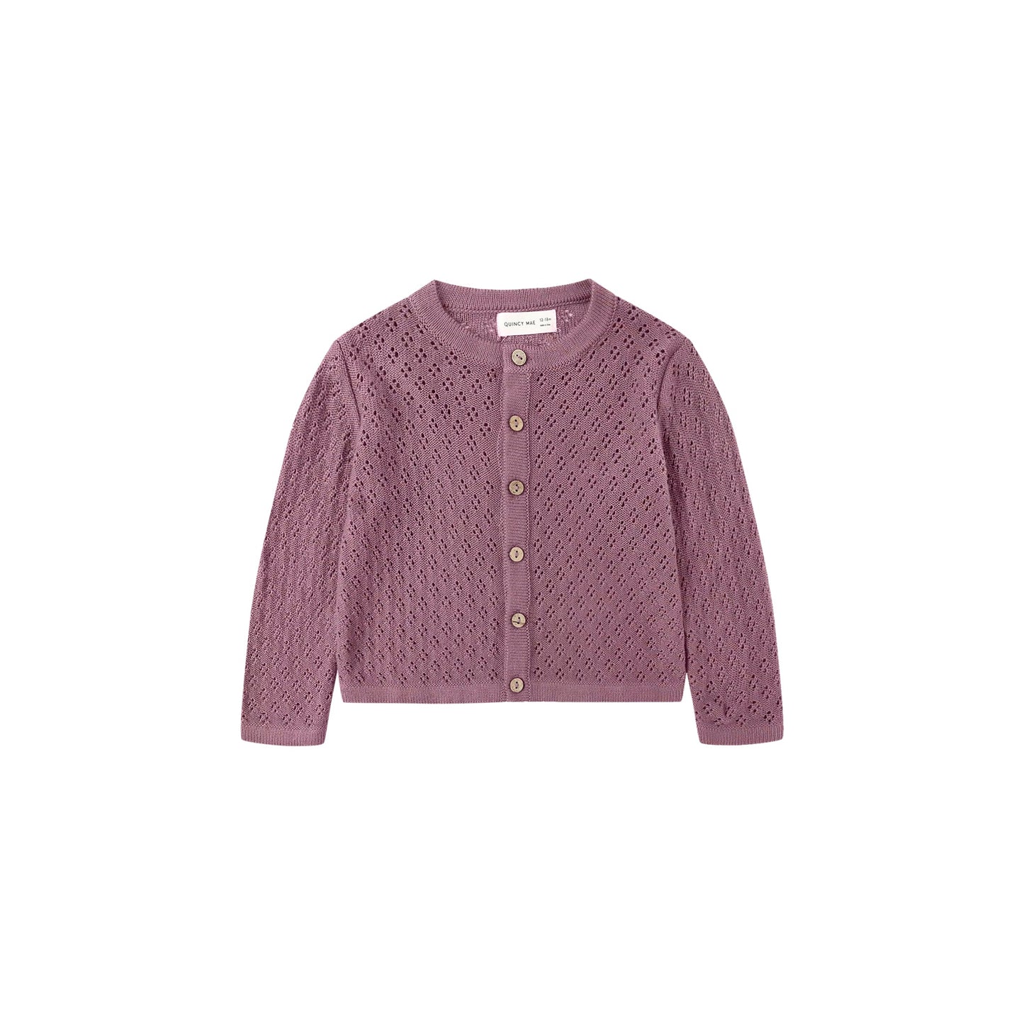 Pink knitted cardigan with button details on a white background