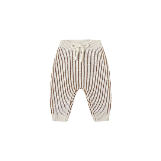 Striped baby pants with a bow on a white background