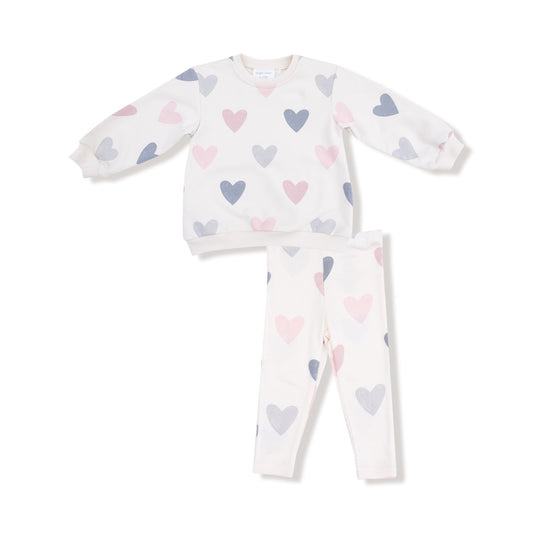 Children's pajama set with heart pattern on a white background