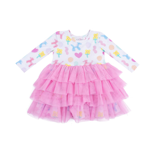Pink dress with colorful patterns on a white background