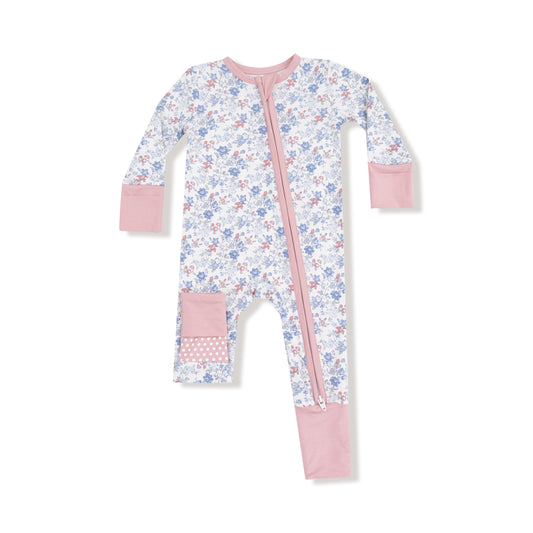 Floral baby onesie with pink accents on a white background