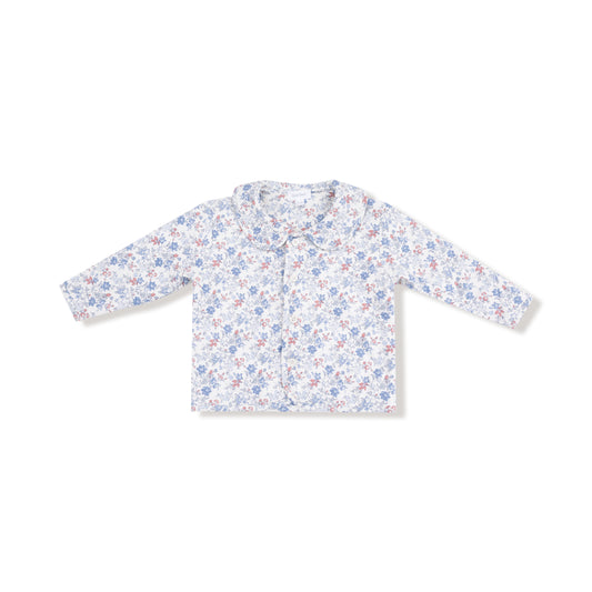 Floral patterned baby shirt on a white background