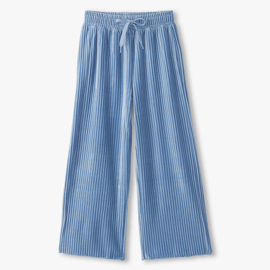 Blue ribbed pants on a white background