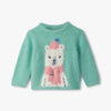 Teal sweater with a polar bear design on a white background