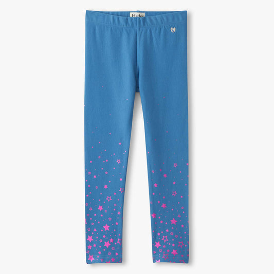 Blue leggings with pink star pattern on a white background