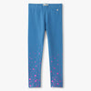 Blue leggings with pink star pattern on a white background