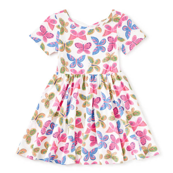 Children's dress with colorful butterfly pattern on a white background