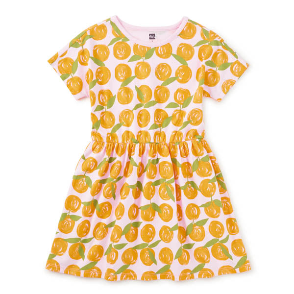 Dress with lemon pattern on a white background