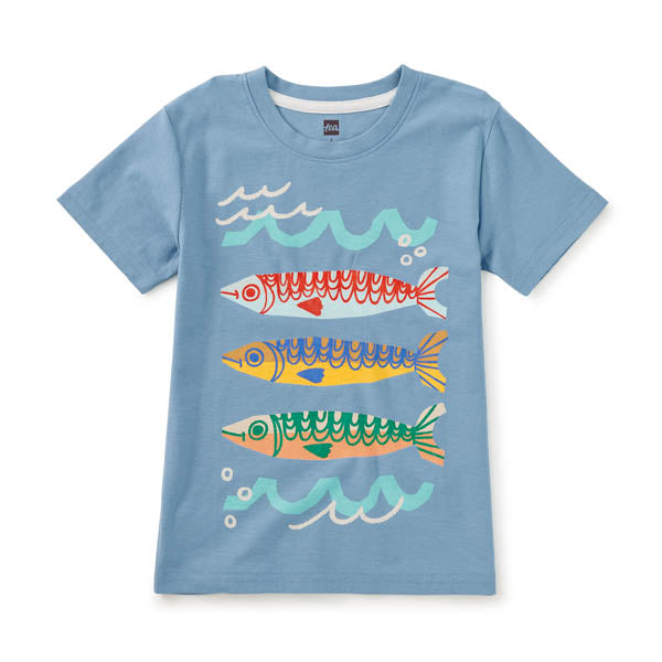 Children's t-shirt with colorful fish design on a light blue background