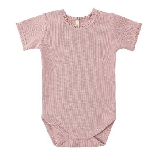 Pink baby bodysuit with short sleeves on a white background