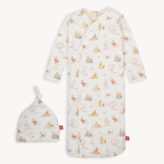 Baby sleeping bag and hat set with animal pattern on a white background