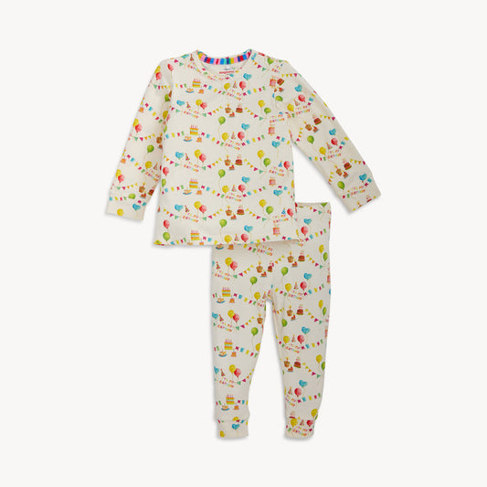 Children's pajama set with colorful pattern on a white background
