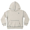 Beige hoodie with 'PLAY' text on a white background