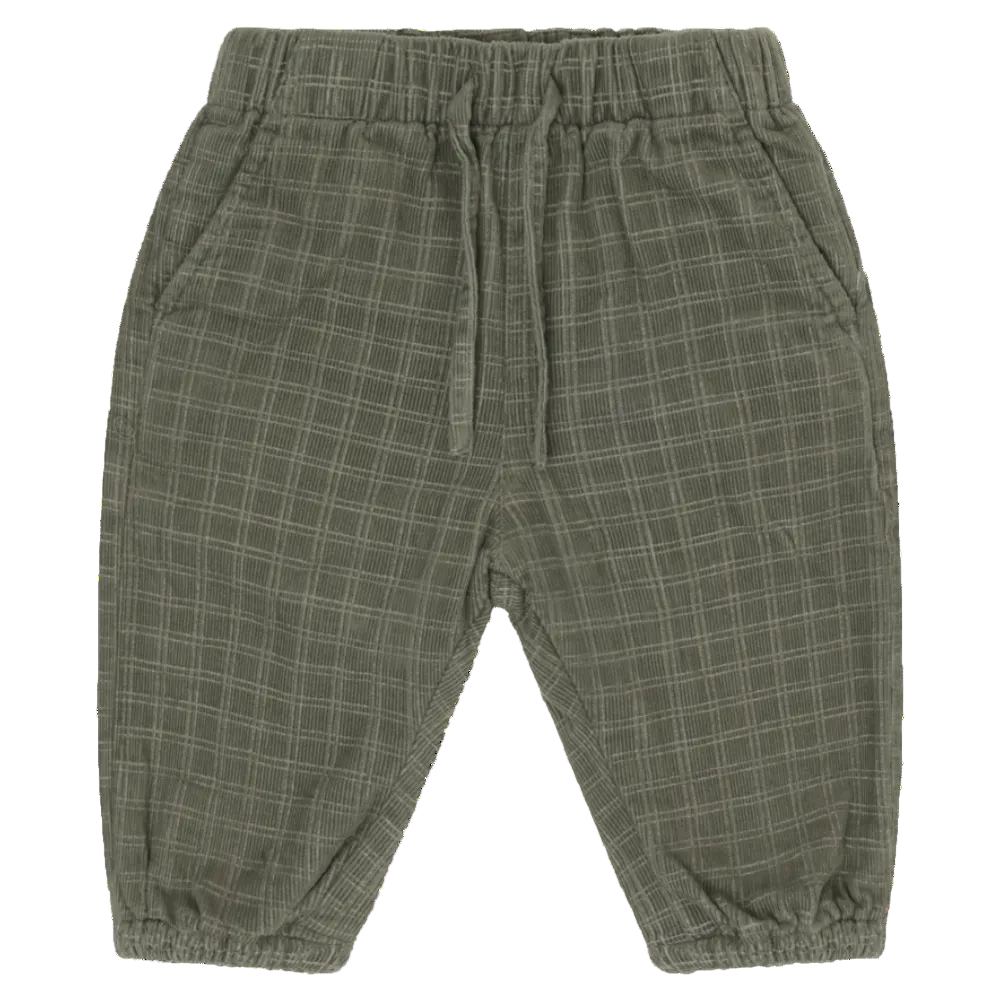Plaid patterned pants on a white background