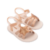 Pair of children's sandals with star design on a white background