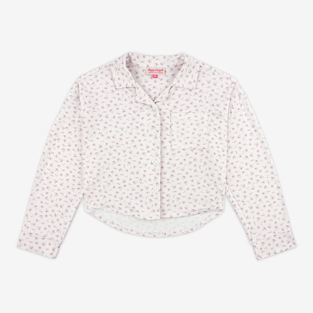 White blouse with small pattern on a white background