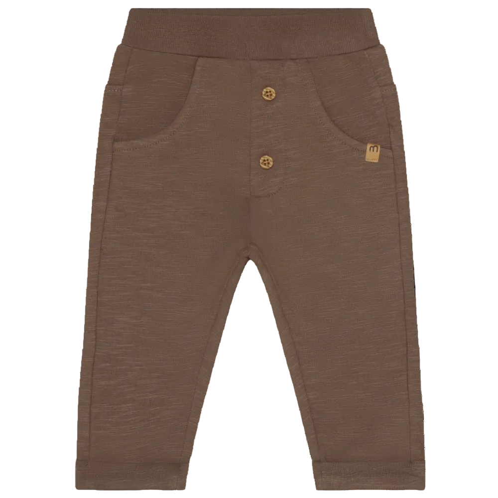 Brown baby pants with buttons on a white background