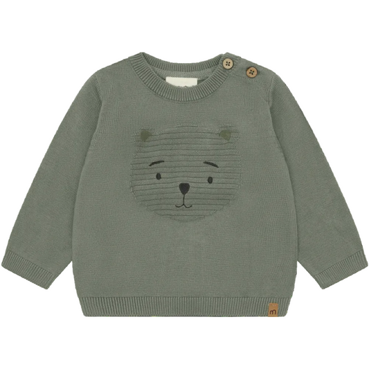 Green sweater with bear face design on a white background