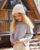 Girl wearing the Wildflower Luna Top standing outdoors