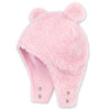 Pink fuzzy hat with a pom-pom on a white background